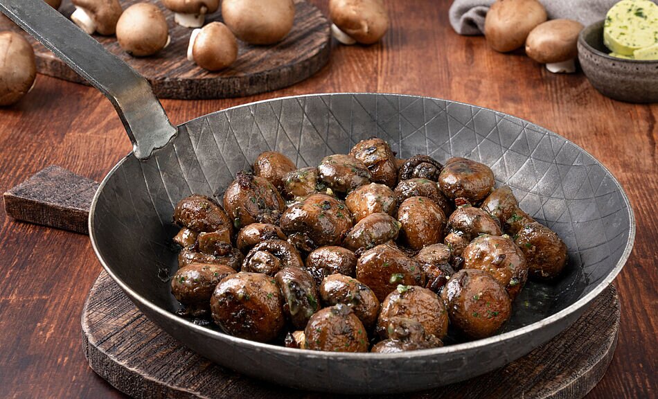 Gebakken champignons in kruidenboter